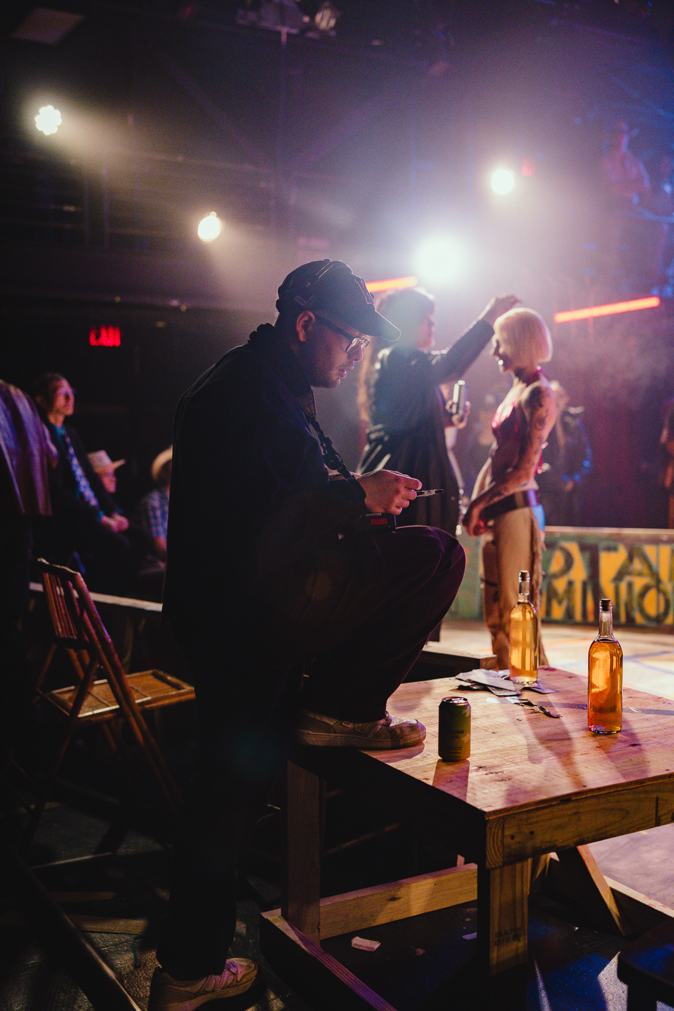 On-set — director in foreground, Monique working on talent